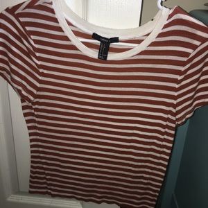 Orange and white striped crop top